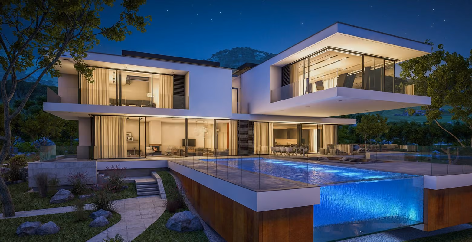 Luxury modern home at dusk with infinity pool